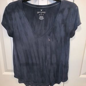 Small bleach stain, but it is a new shirt.